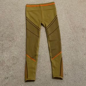 Fabletic’s green + orange sports leggings